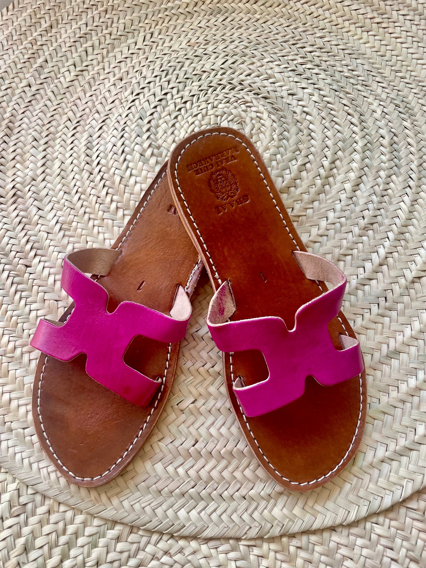 Magenta leather slippers