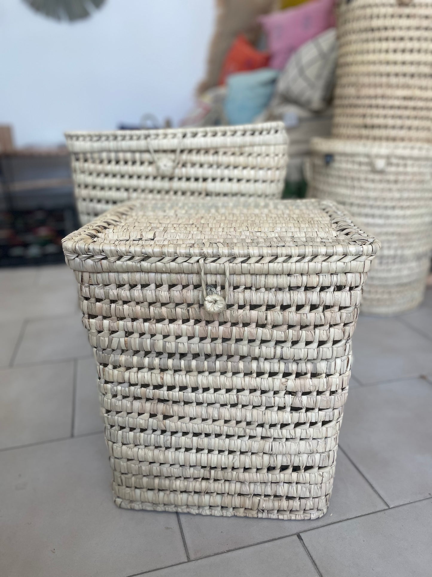 A basket with a square lid