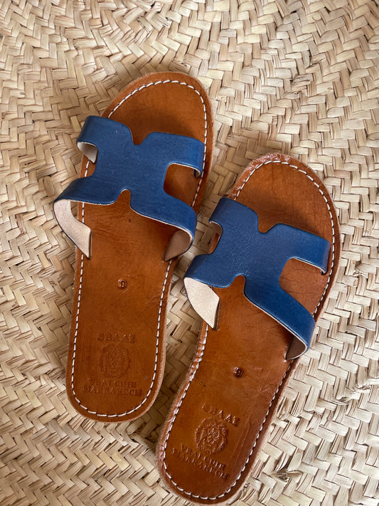 Blue leather slippers